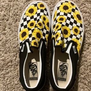 Vans Black and Yellow Sunflower Slip-On Sneakers